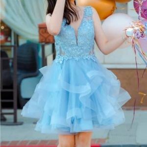 Beautiful mini dress in baby blue color from Lili’s Beverly Hills